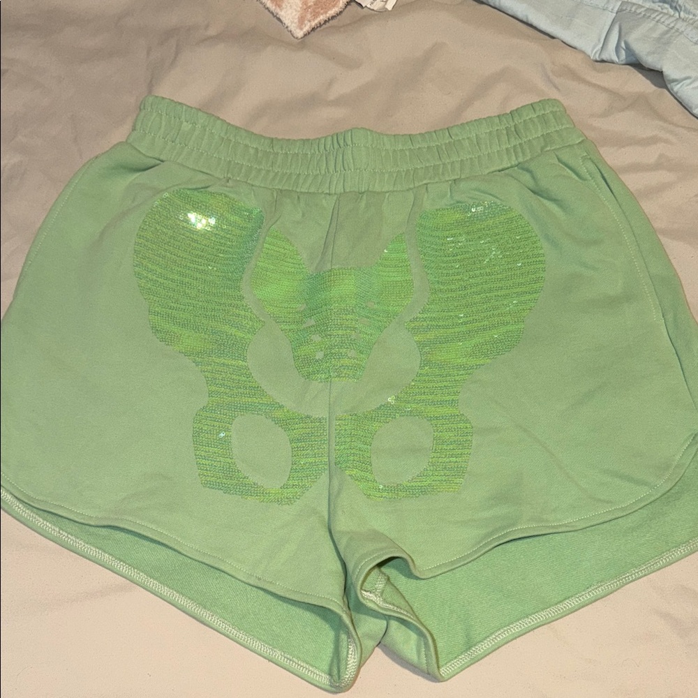 NWT QUEEN OF SPARKLES Halloween Light Green Shorts
